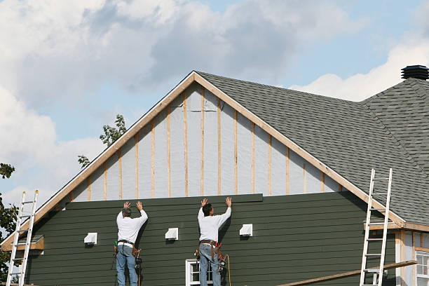 Professional Siding technician working in Girard, PA